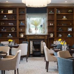 Elegant restaurant dining room with cozy seating and stylish decor