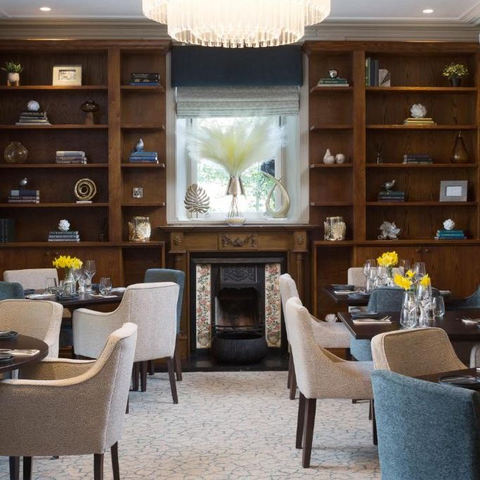 Elegant restaurant dining room with cozy seating and stylish decor
