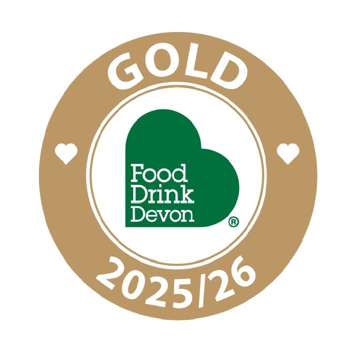 Food Drink Devon Gold Award 2025/26 badge on a gold circular background