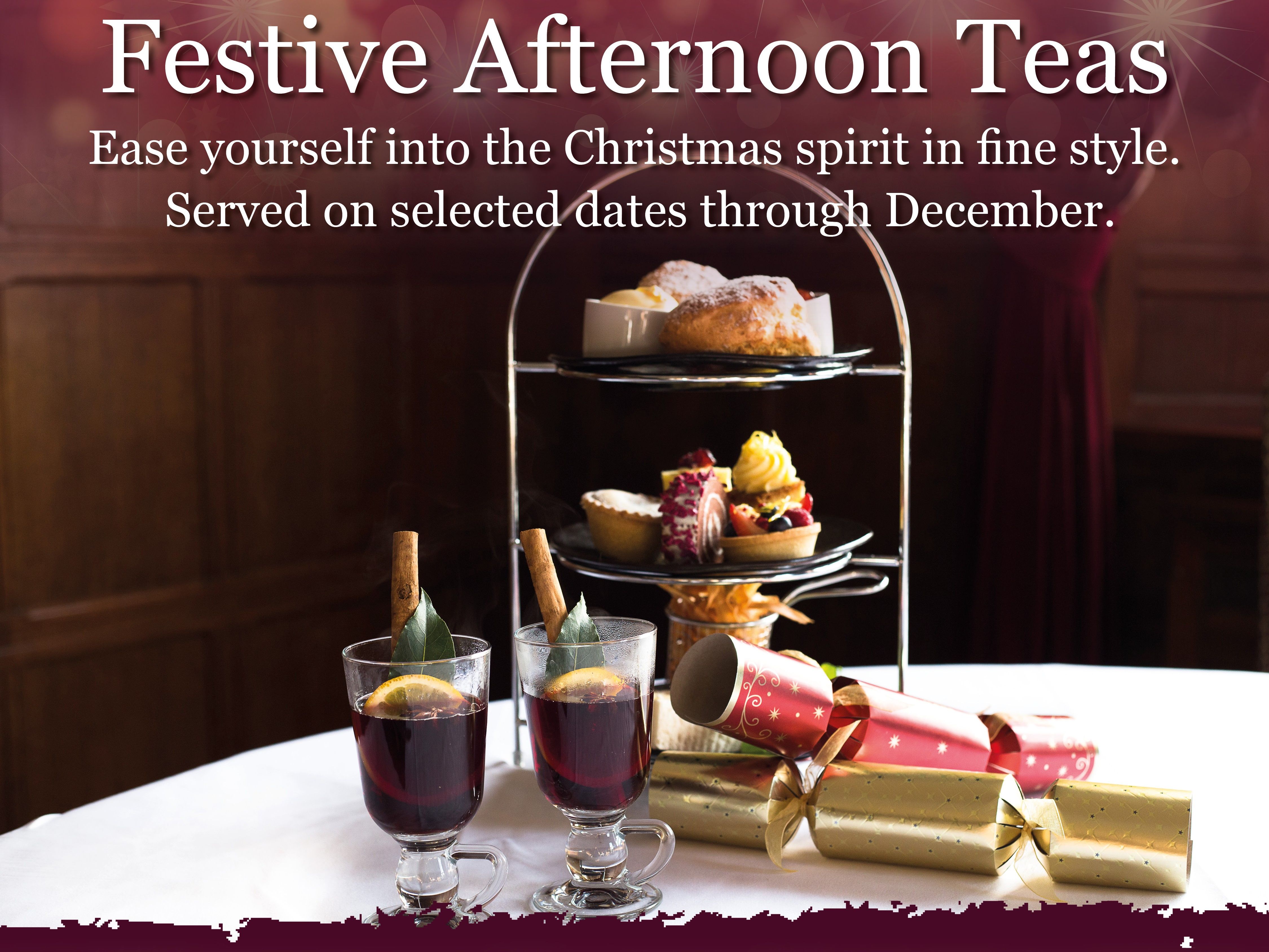Festive afternoon tea setup with pastries, mulled wine, and Christmas crackers at The Bedford Hotel.
