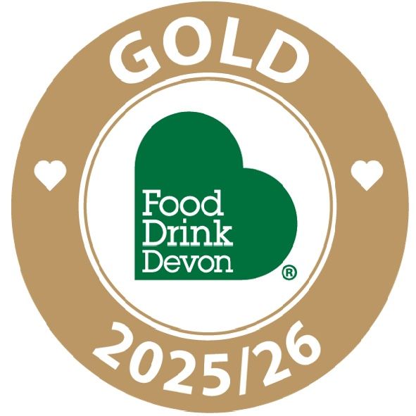Food Drink Devon Gold Award 2025/26 badge with green heart logo