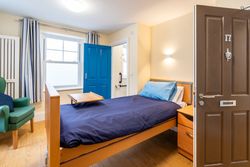 Bedroom with blue bedding
