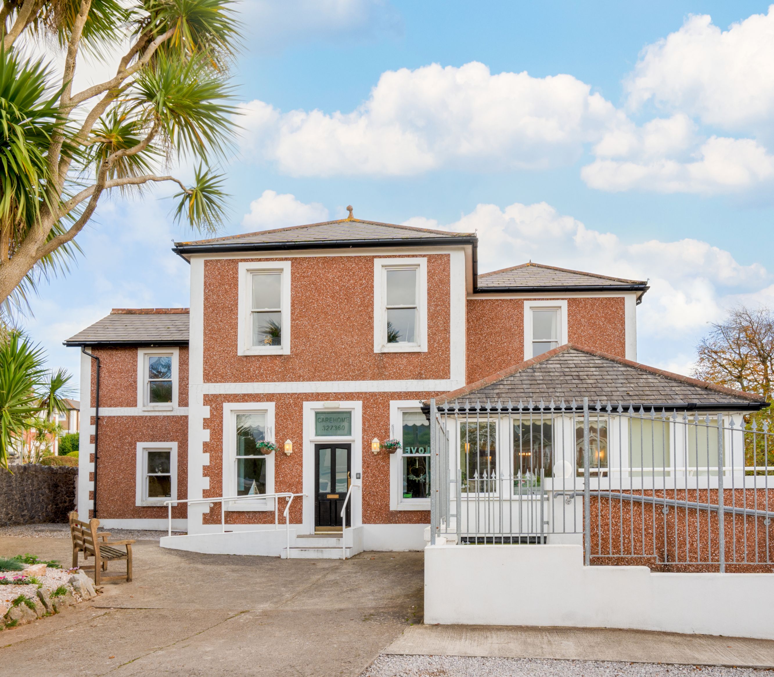 A red-brick building with white trim A red-brick building with white trim A red-brick building with white trim