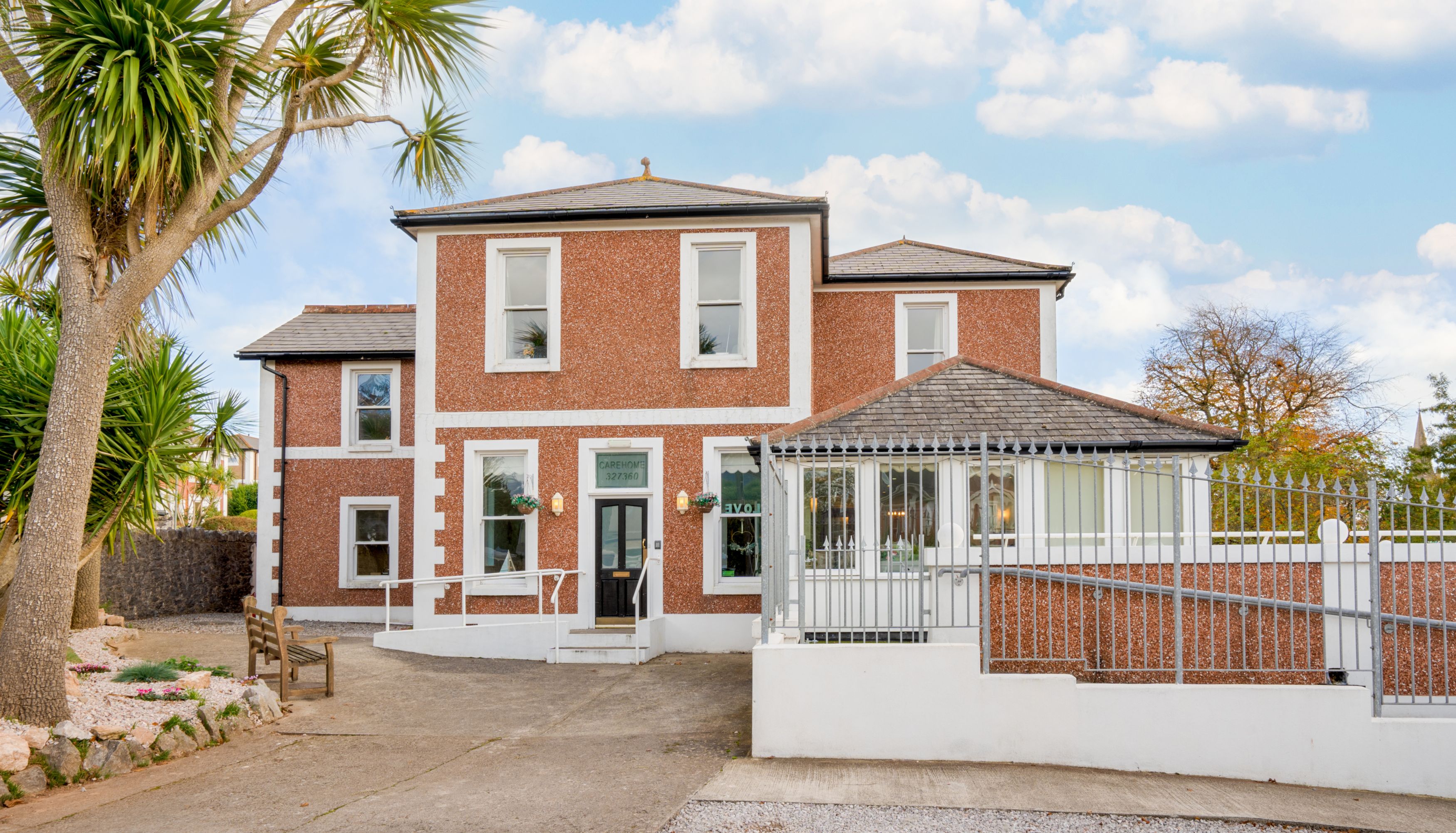 A red-brick building with white trim A red-brick building with white trim A red-brick building with white trim