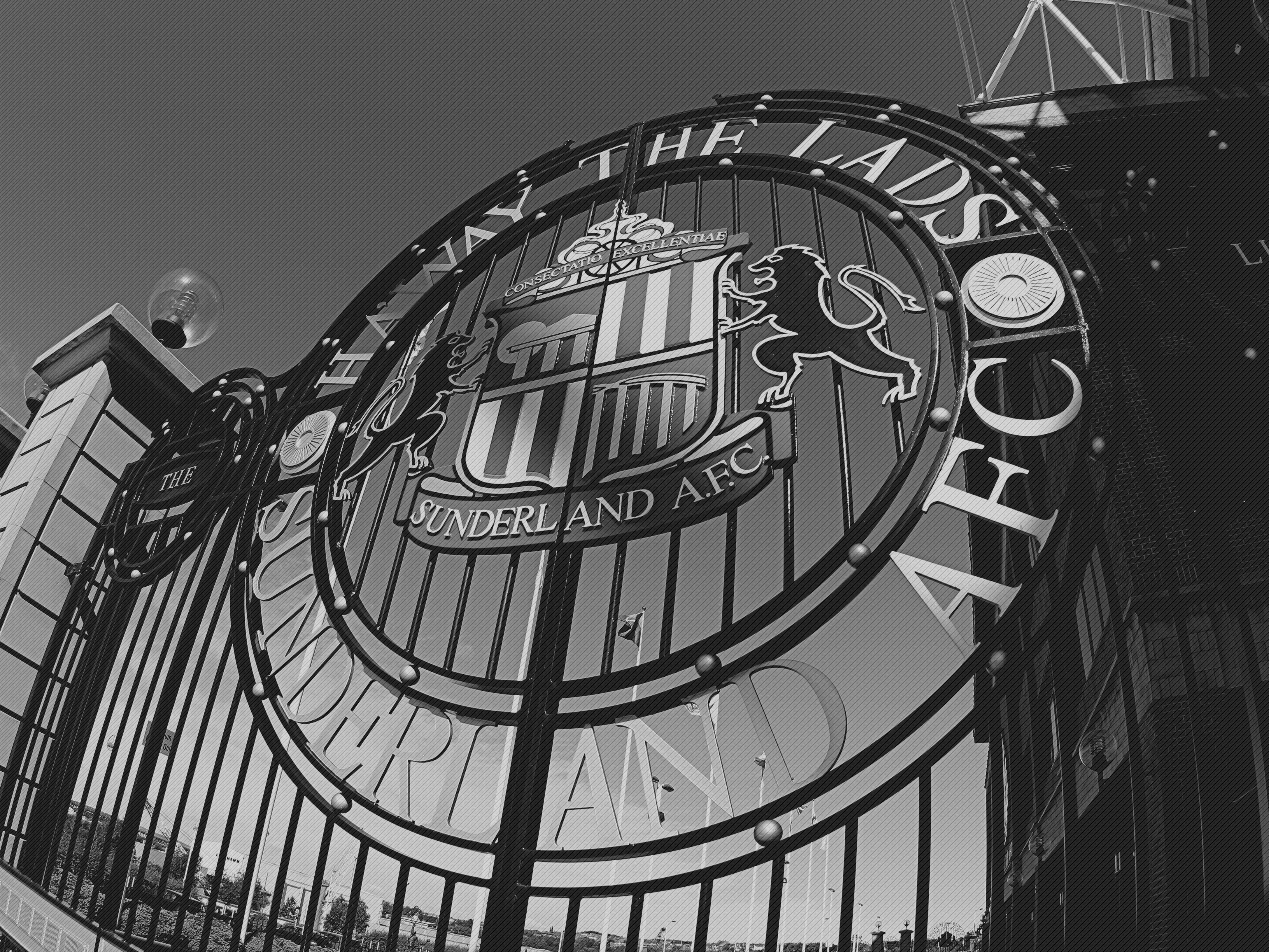 Iron gates featuring the Sunderland A.F.C. crest at a stadium entrance