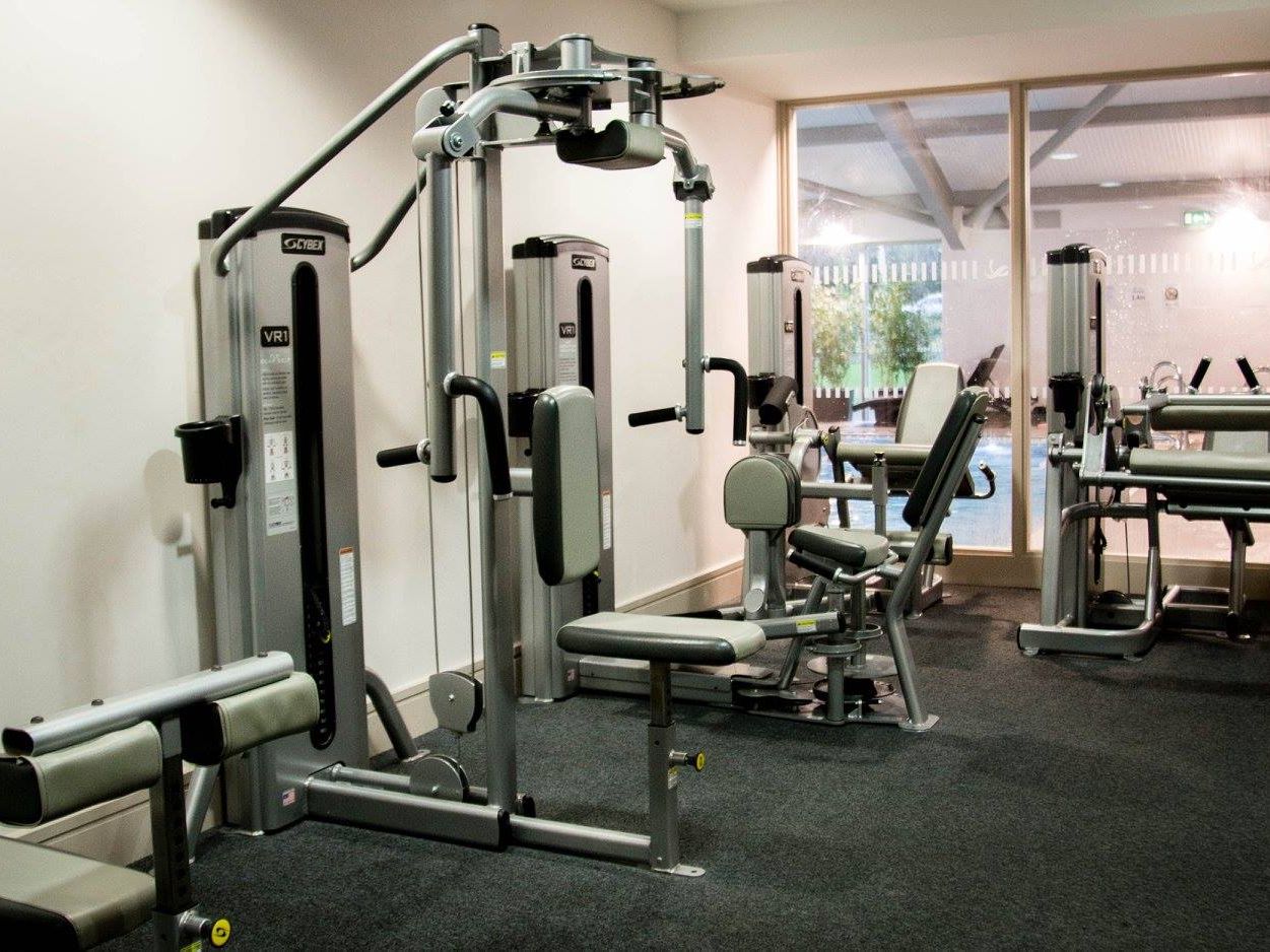 Modern gym with various workout machines