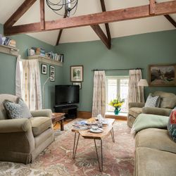 lounge in peace and plenty with soft furnishings and beams
