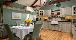 open plan living area made up of the kitchen dining area and lounge