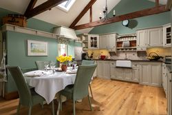 open plan living area made up of the kitchen dining area and lounge