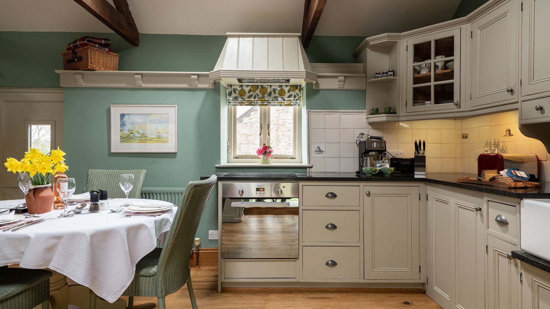 open plan living area made up of the kitchen dining area and lounge