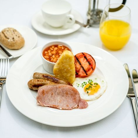 Full English Breakfast with bacon, hashbrowns and orange juice