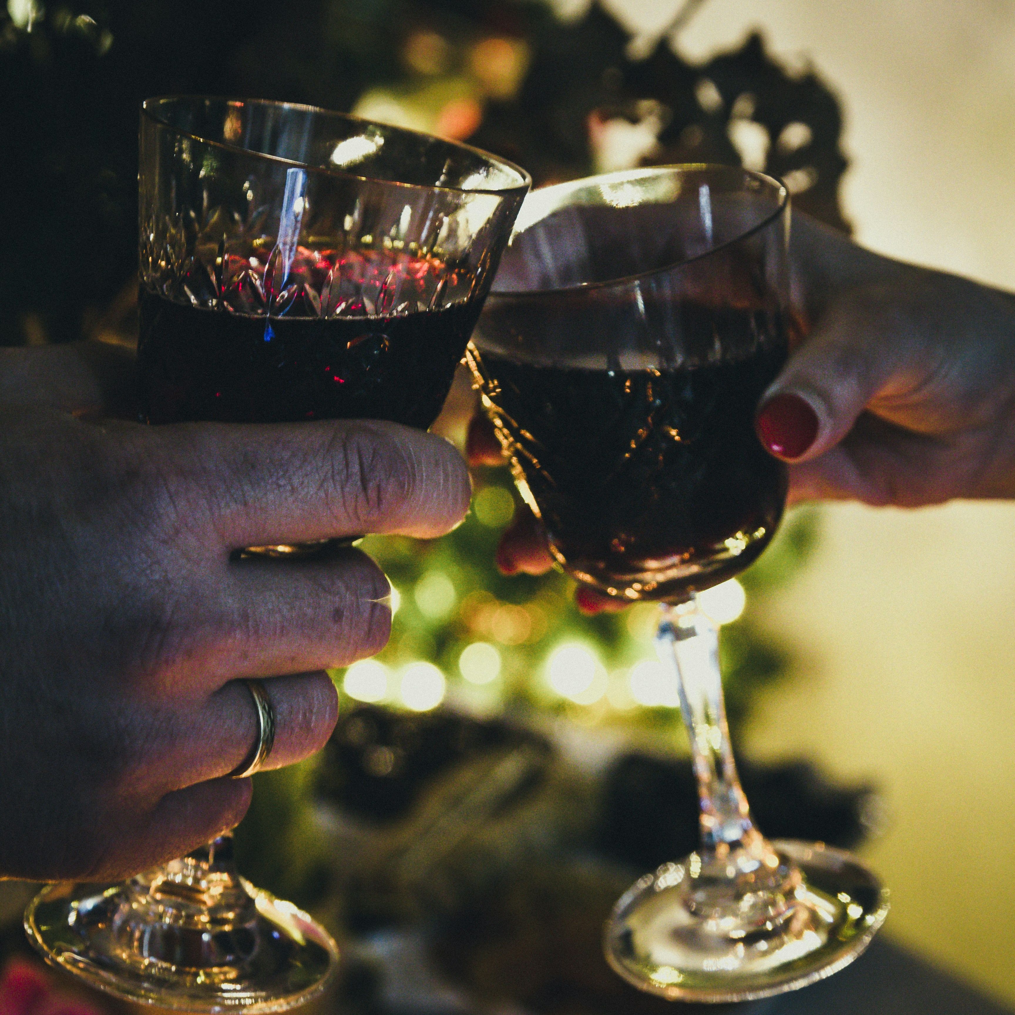 Two Wine Glasses Clinking Together