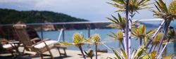 Sun loungers overlooking the water