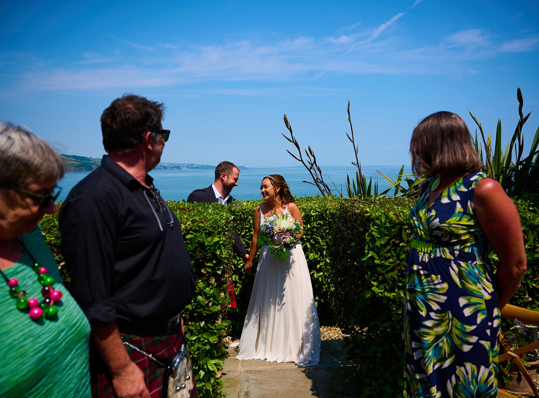 Bridal party with sea view