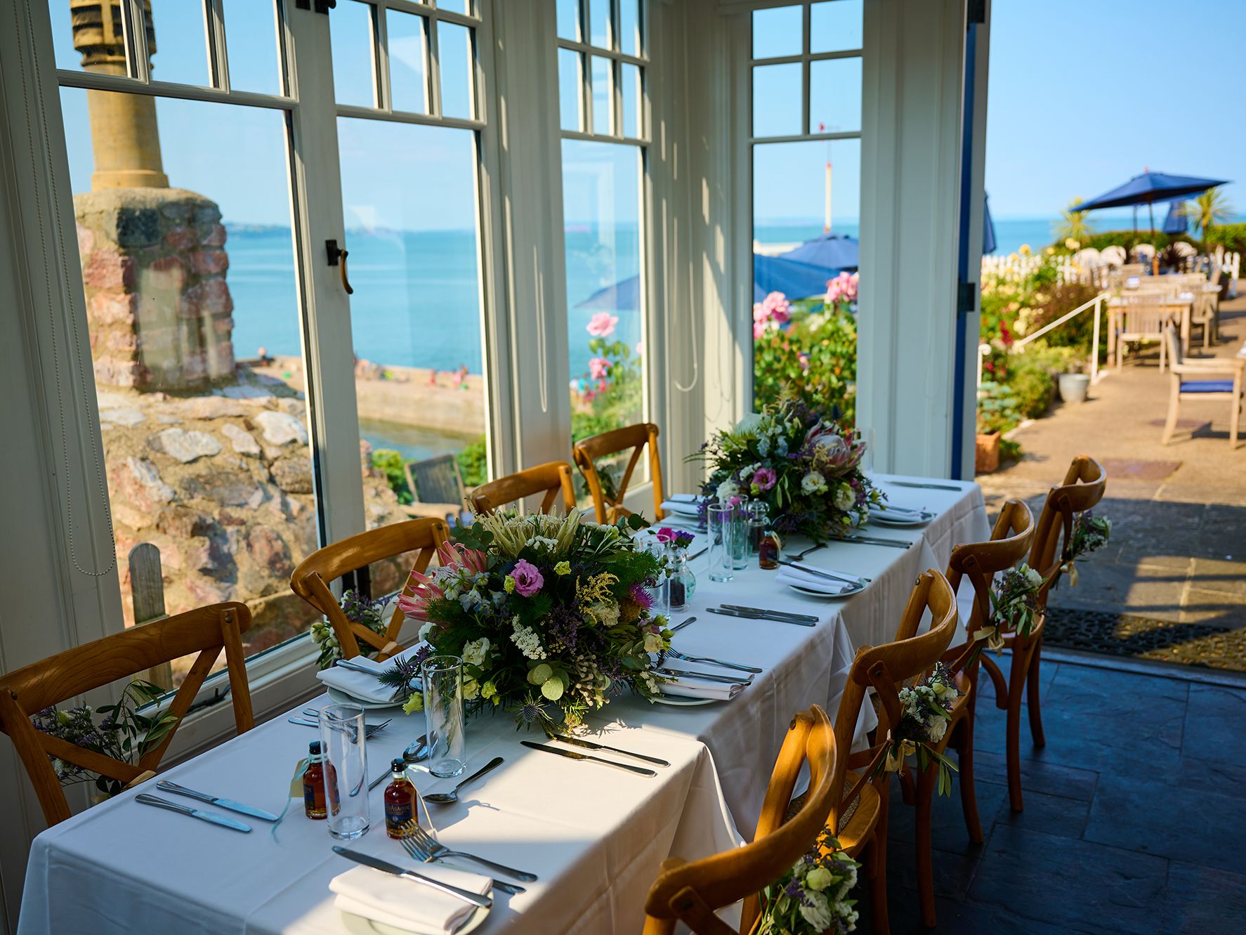 Table dressed for a wedding with sea view