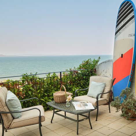 CaryArms_CoveCottage_TerraceWithSUP_162