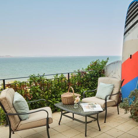 CaryArms_CoveCottage_TerraceWithSUP_162