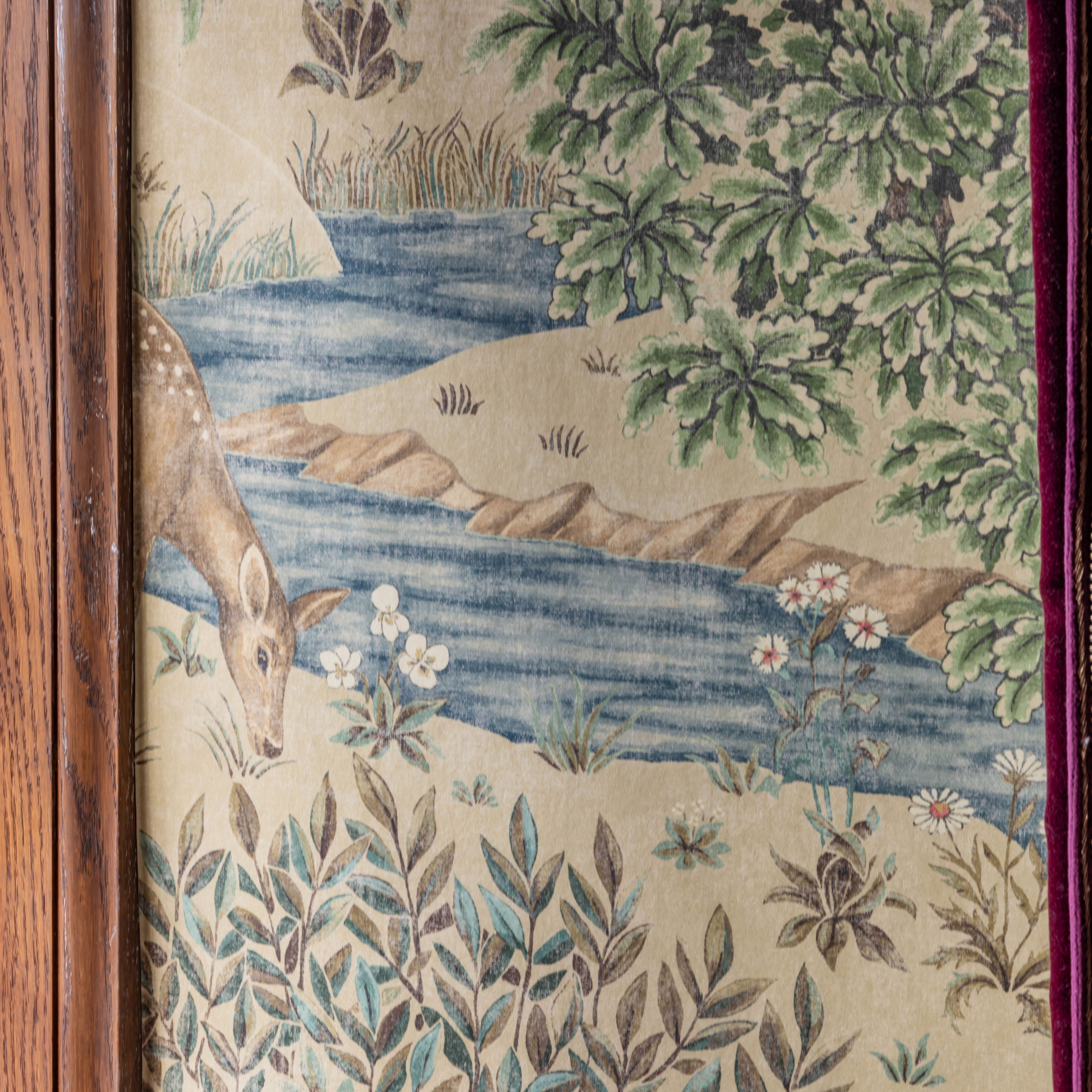 Historic wallpaper featuring a painted deer by a stream with flowers and foliage