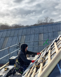 Alex installing the Ornamental Slate Art - House of Marbles