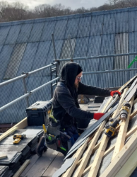 Alex installing the Ornamental Slate Art - House of Marbles
