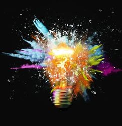 Shattering light bulb with colorful powder explosion
