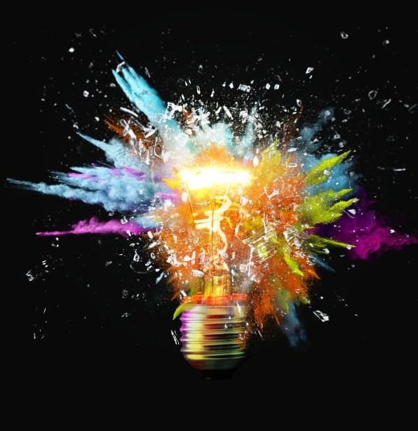 Shattering light bulb with colorful powder explosion