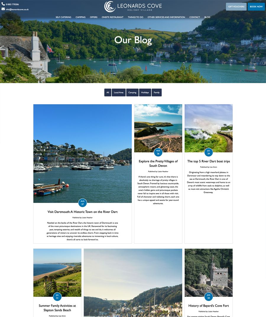 Leonards Cove holiday village blog page with scenic river and village view.