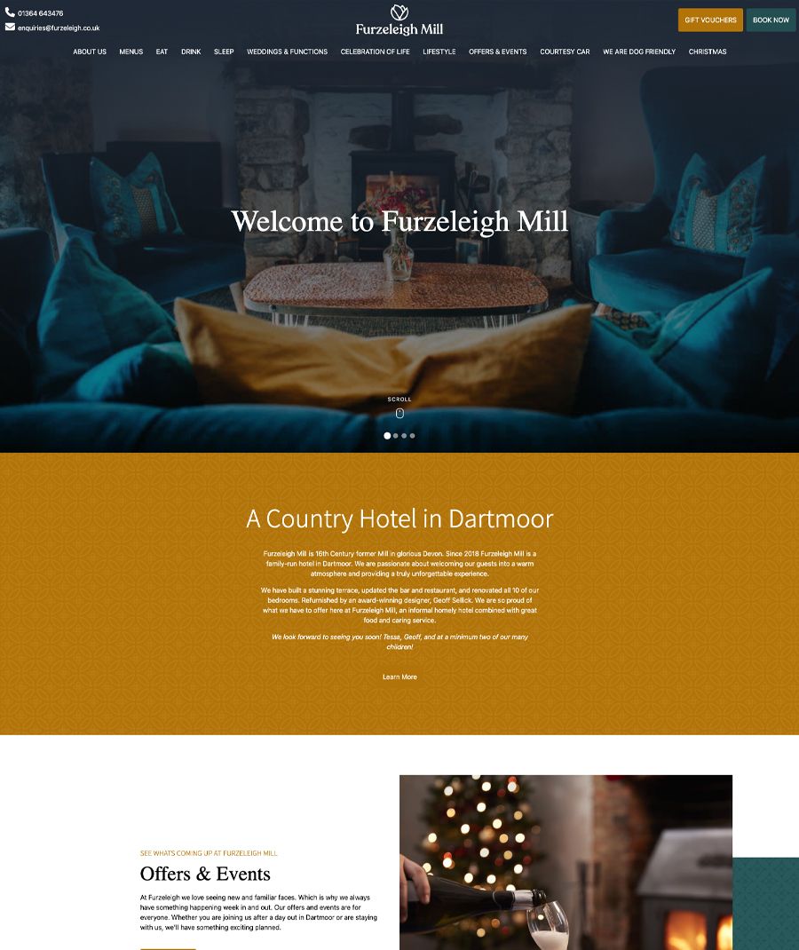 Furzleigh Mill hotel website homepage featuring cozy lounge with sofas and a fireplace
