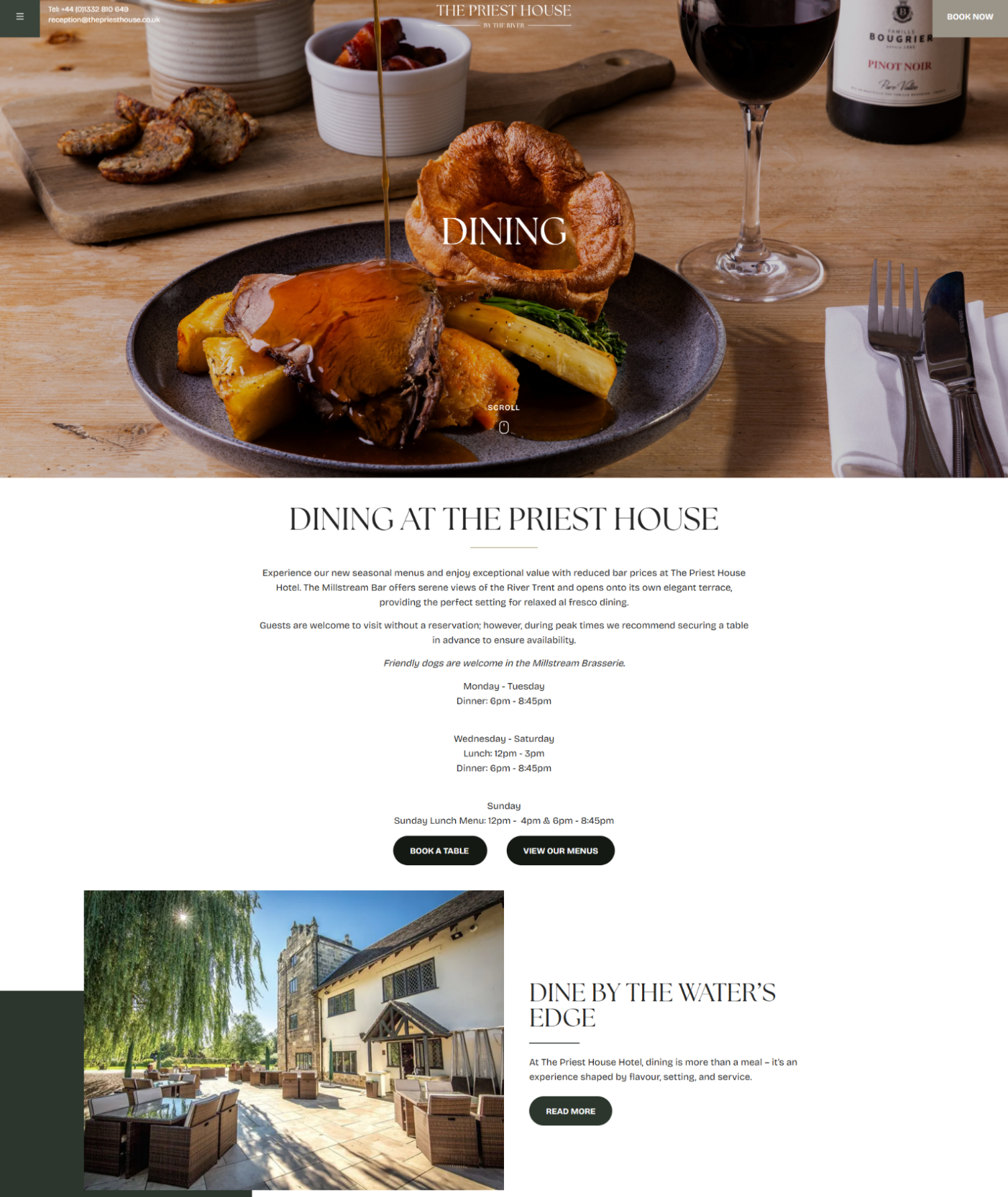 A gourmet roast dinner with vegetables and Yorkshire pudding on a plate, accompanied by a glass of red wine at The Priest House restaurant.
