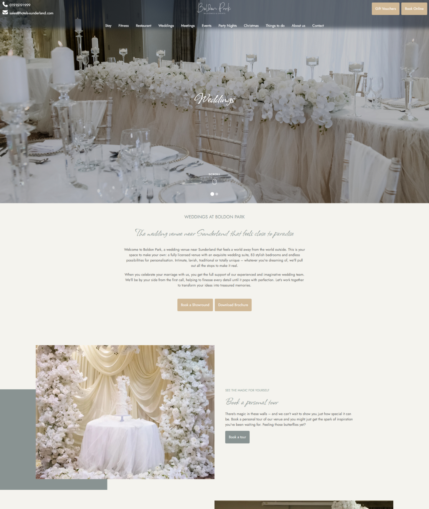 Elegant wedding venue setup with white floral arrangements, candles, and fine table settings at Boldon Park.