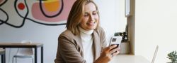 Woman in cafe with laptop