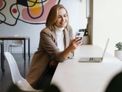Woman in cafe with laptop
