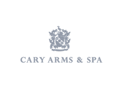 Cary Arms & Spa logo with a crest above the name