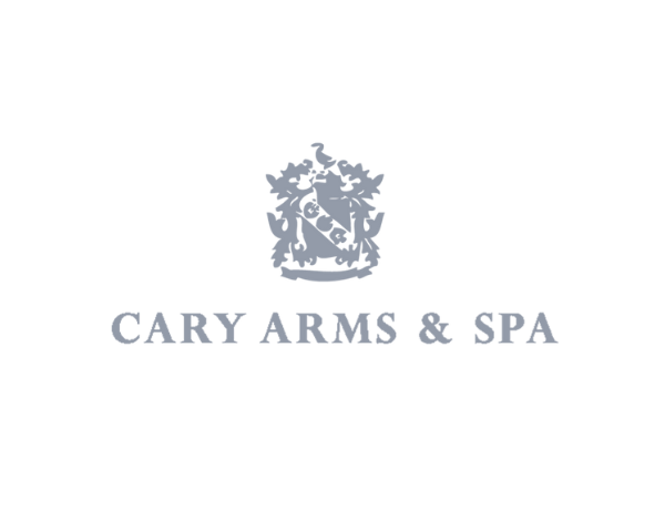 Cary Arms & Spa logo with a crest above the name