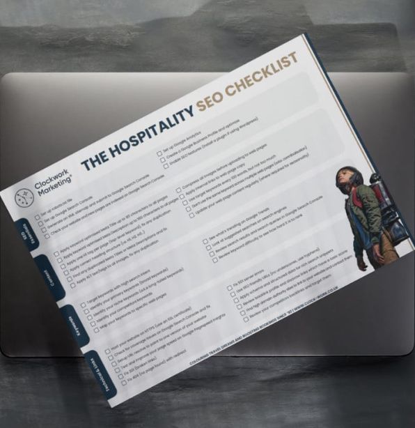 Printed hospitality SEO checklist on a laptop