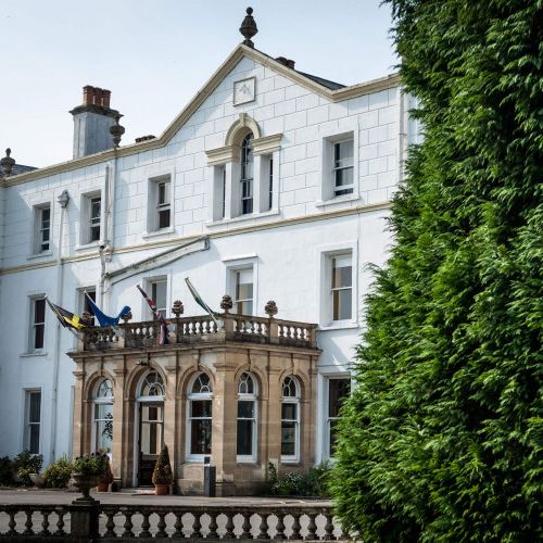 Front view of white building