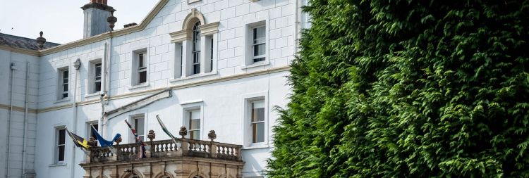 Front view of white building