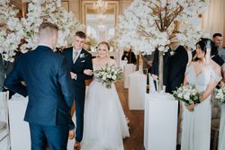Wedding ceremony with white trees decoration