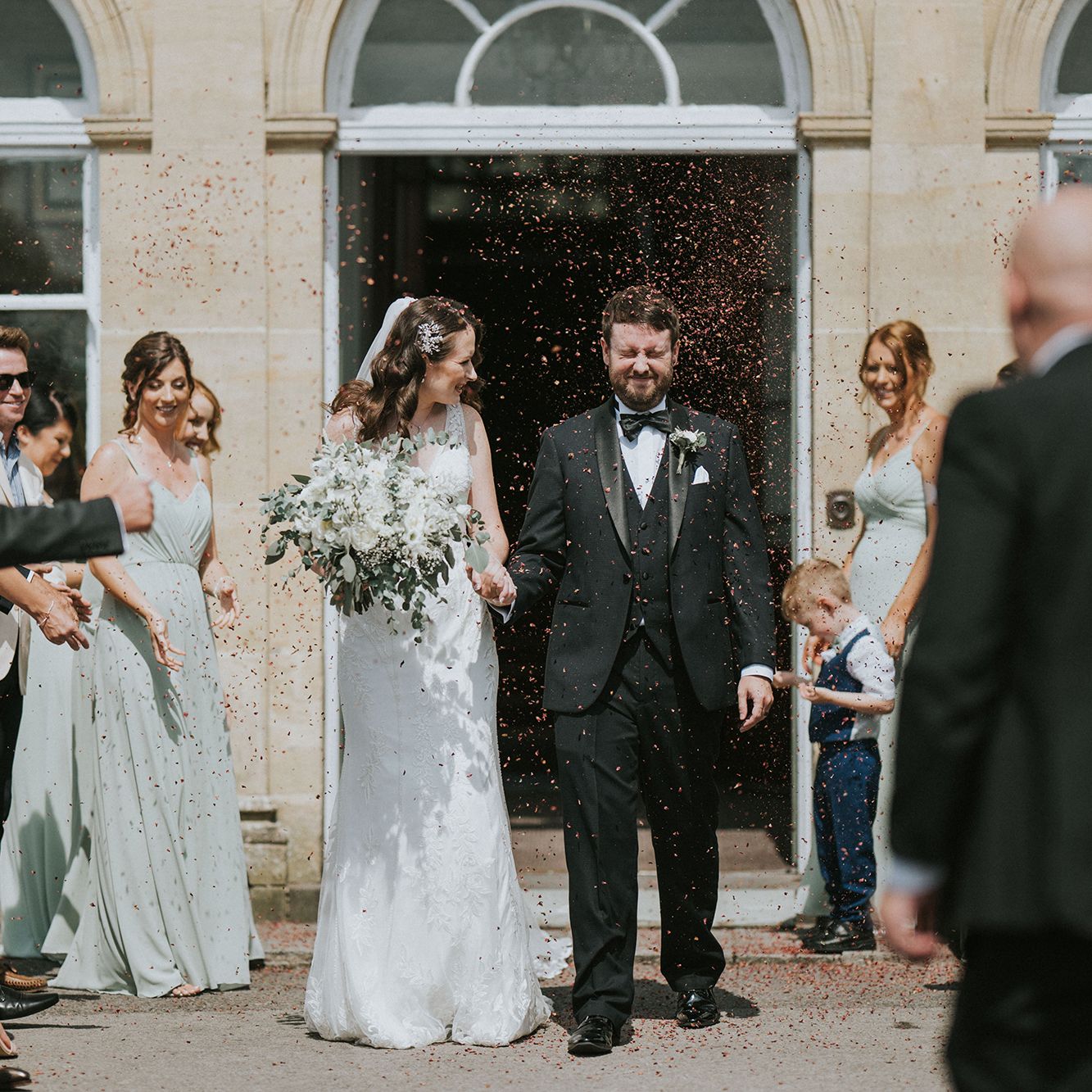 Bride and groom confetti toss