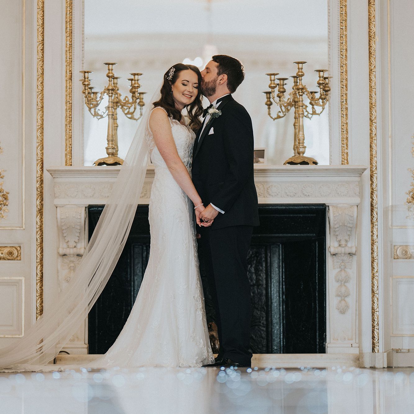 Bride and groom in ballroom