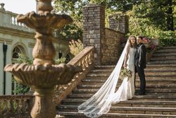 Bride and groom on outside steps