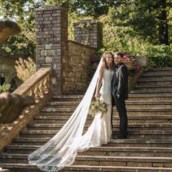 Bride and groom on outside steps