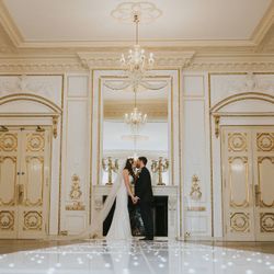 Bride and groom in ballroom