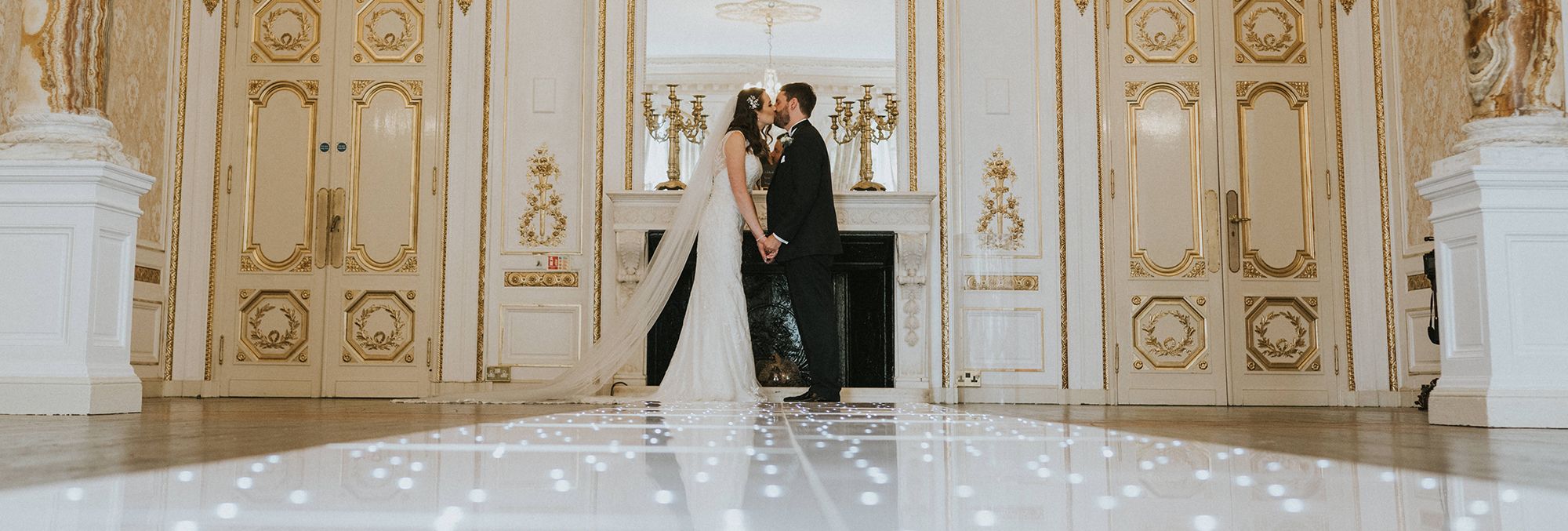 Bride and groom in ballroom