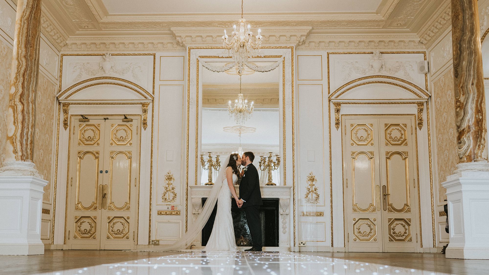 Bride and groom in ballroom