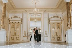 Bride and groom in ballroom