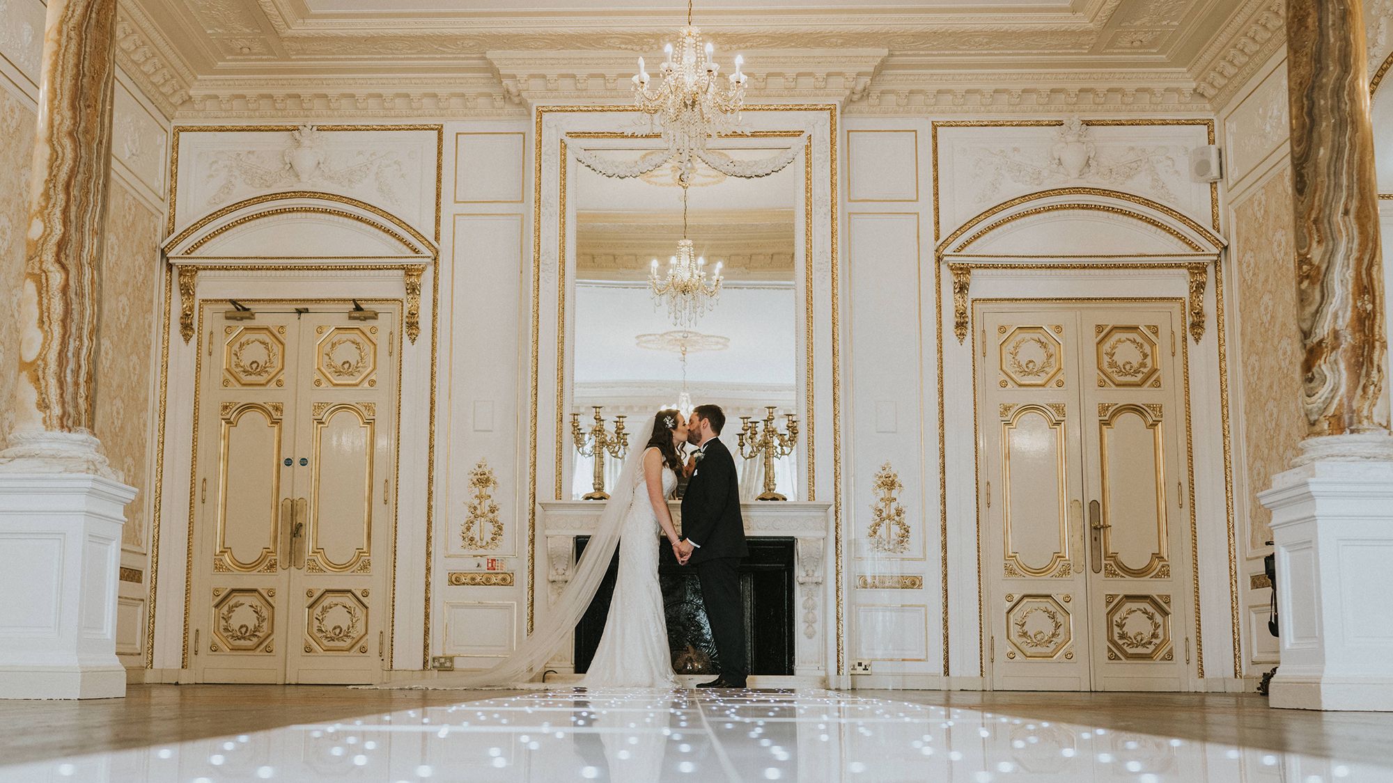 Bride and groom in ballroom
