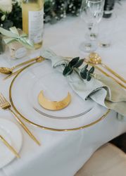 Wedding table set up with gold and white theme