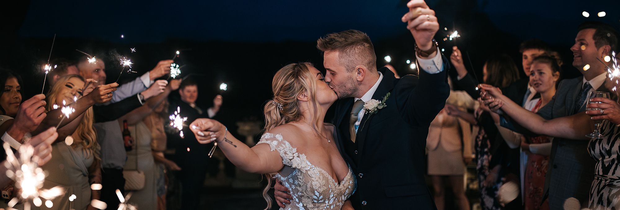 Bride and groom sparkler send off