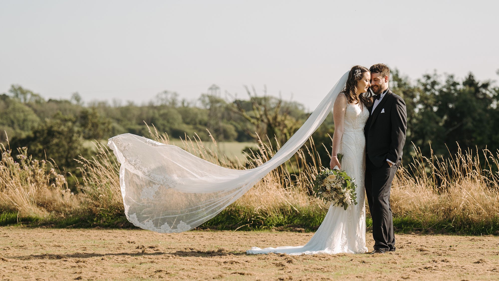 Bride and groom outside